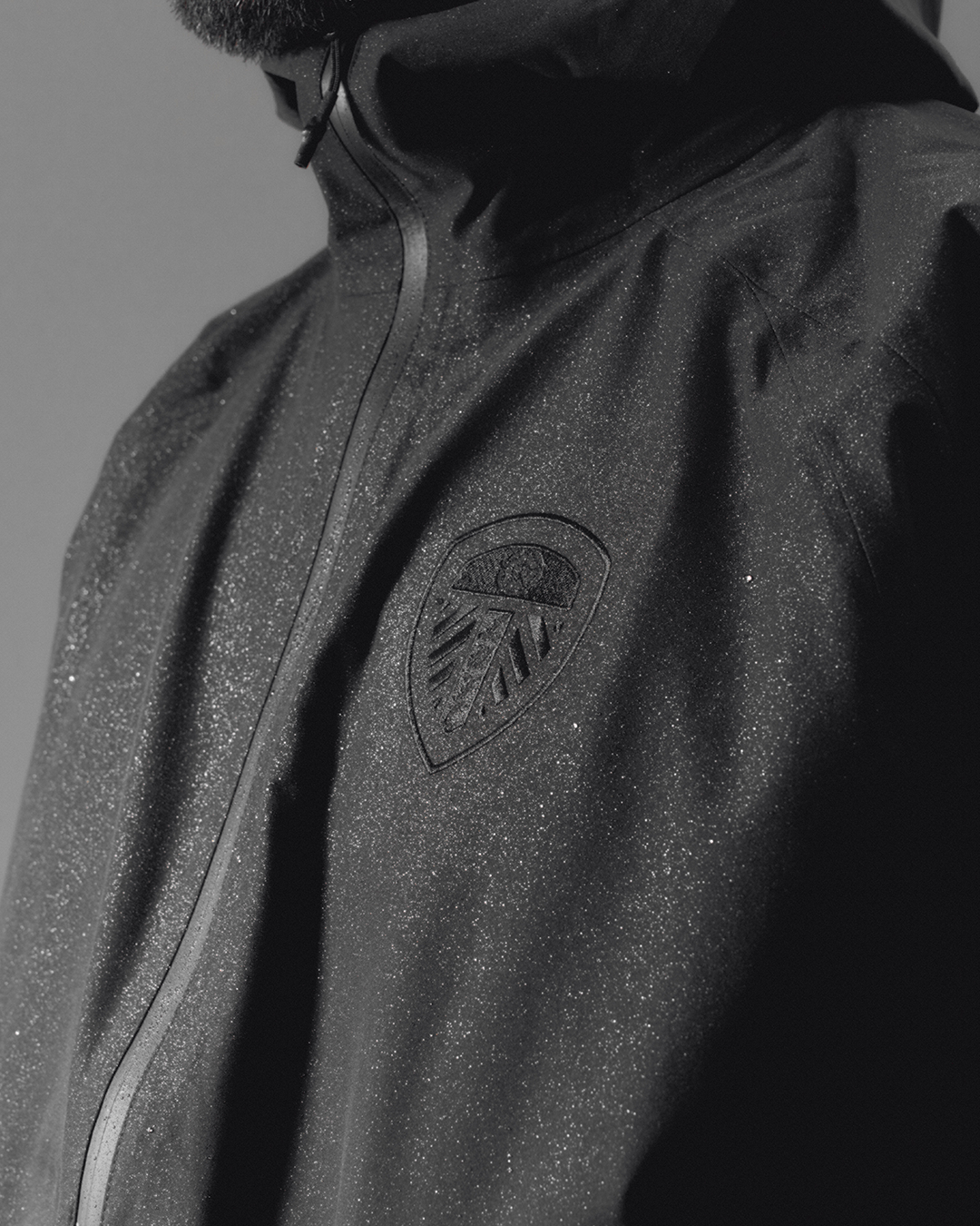 AOF Leeds United Shell Jacket | Black Coat | Art of Football